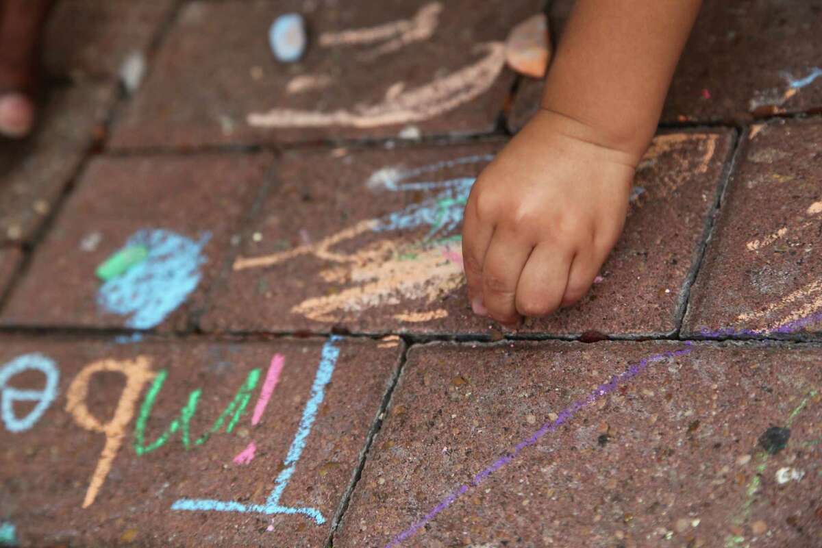 Houston Street was the colorful scene for artists of all ages at Chalk It Up 2013.
