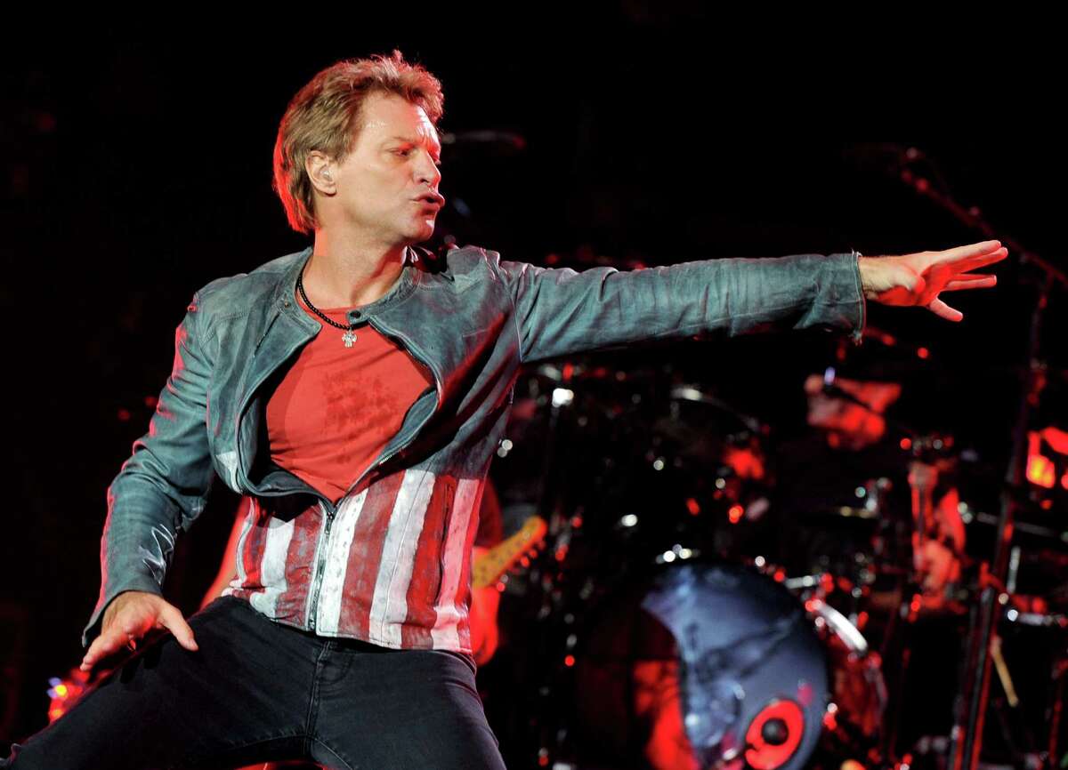  Musician Jon Bon Jovi performs at The Staples Center on October 11, 2013 in Los Angeles, California.