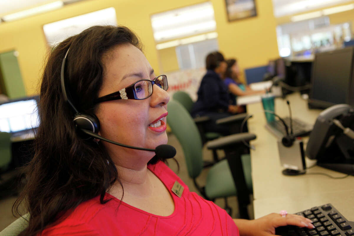 Azenet Hernandez takes a call Oct. 4, 2013 at San Antonio Marriott Global Reservations & Customer Care. The call center has about 600 employees working there and has won many awards since 1999 when they started there, including awards for Top Workplaces. Midsize: Red Ventures Small: Catapult Systems
