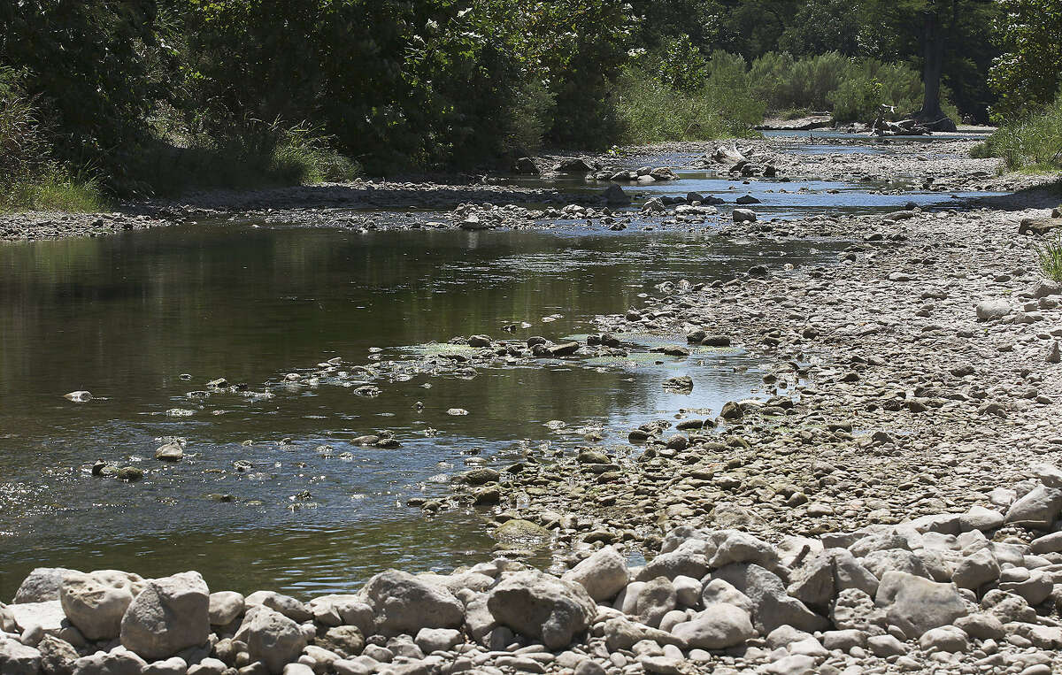 The river bottom can be seen along stretches of the Guadalupe River near Bergheim in August. Despite recent heavy rains, Texas is still facing a water crisis, a reader points out.