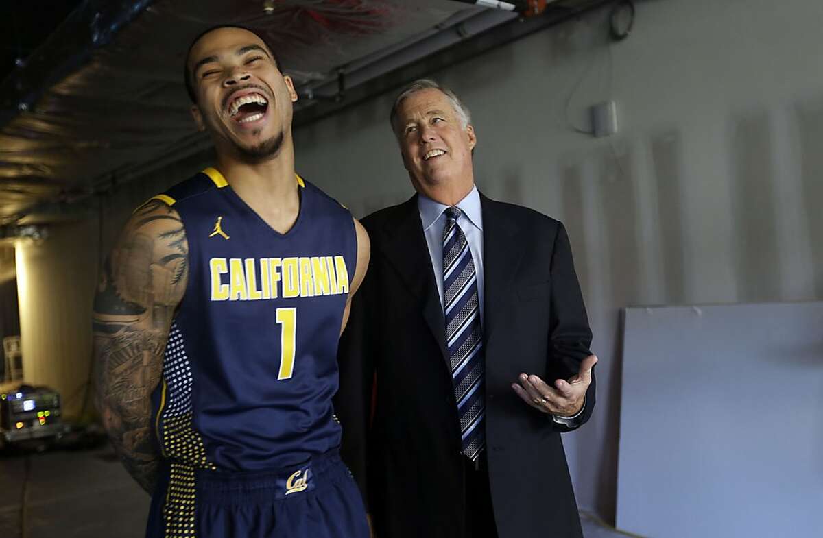California's Justin Cobbs, left, jokes with head coach Mike Montgomery at the Pac-12 NCAA college basketball media day on Thursday, Oct. 17, 2013, in San Francisco. (AP Photo/Marcio Jose Sanchez)