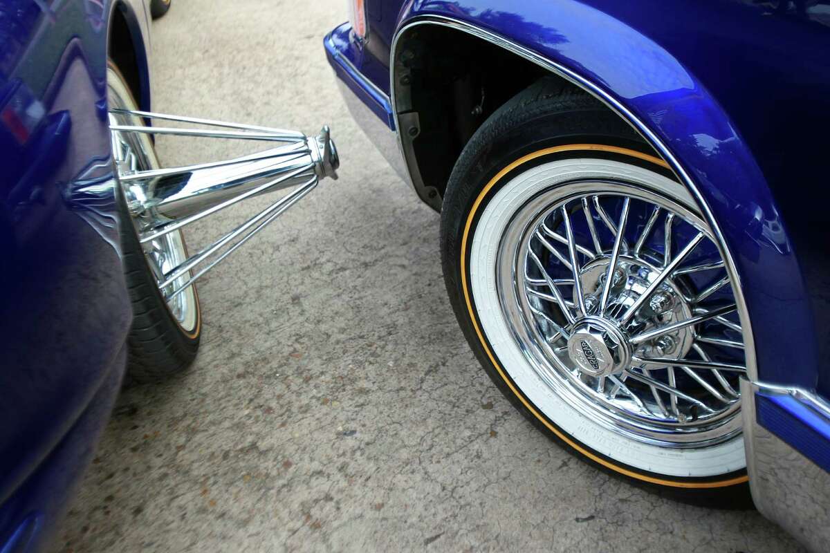 Rims and good tires can be found on the cars of B.G. Porter, who runs a customizing car shop﻿.