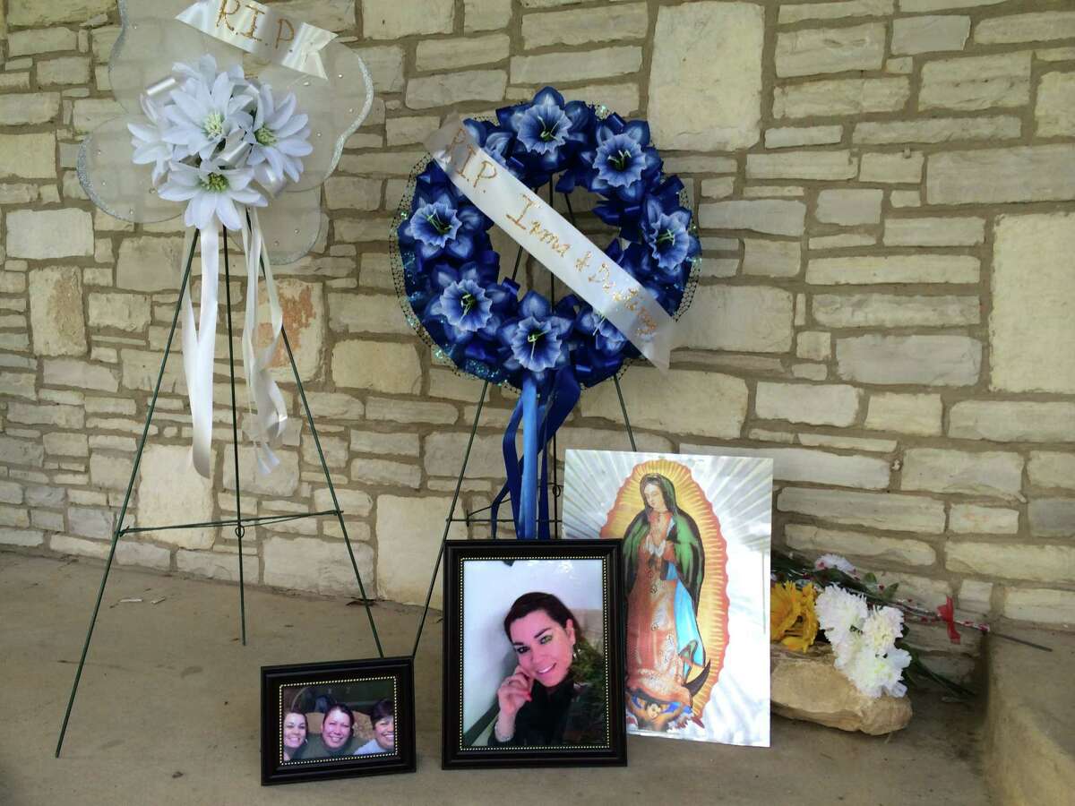Neighbors and family members built a memorial to Irma Davila and her daughter, Destiny, on their front porch on Globe Avenue. The two were found dead at the home Thursday. Police believe Hector Davila -- Irma's estranged husband and Destiny's father -- killed them before fatally shooting himself.