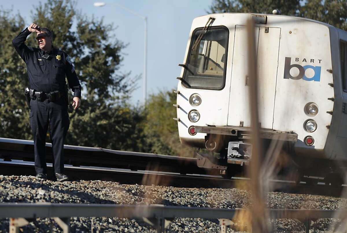 Police investigate an accident scene where a BART train struck two people, neither of which survived, October 19, 2013 in Walnut Creek, Calif.