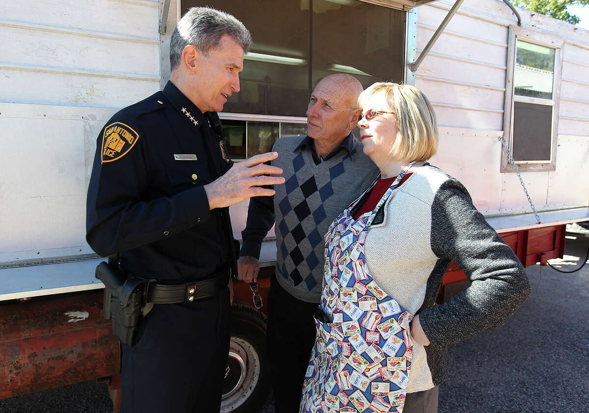 Chief William McManus (center) speaks with Sandy Phillips (right) and her husband Lonnie who lost their daughter, Jessica Ghawi, in the 2012 Aurora mass shooting during a counter gun rally by Moms Demand Action on Saturday, Oct. 19, 2013. About two dozen people and their children colored, offered face painting and held a sign up to join the organization that strongly endorses background checks for prospective gun owners.