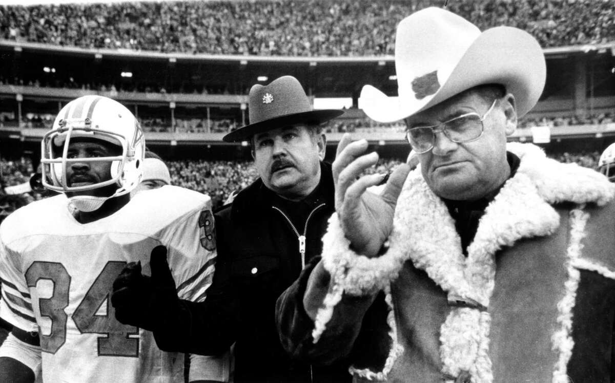 Earl Campbell, left, says playing for Bum Phillips' Oilers was a perfect fit. They both enjoyed the country lifestyle.