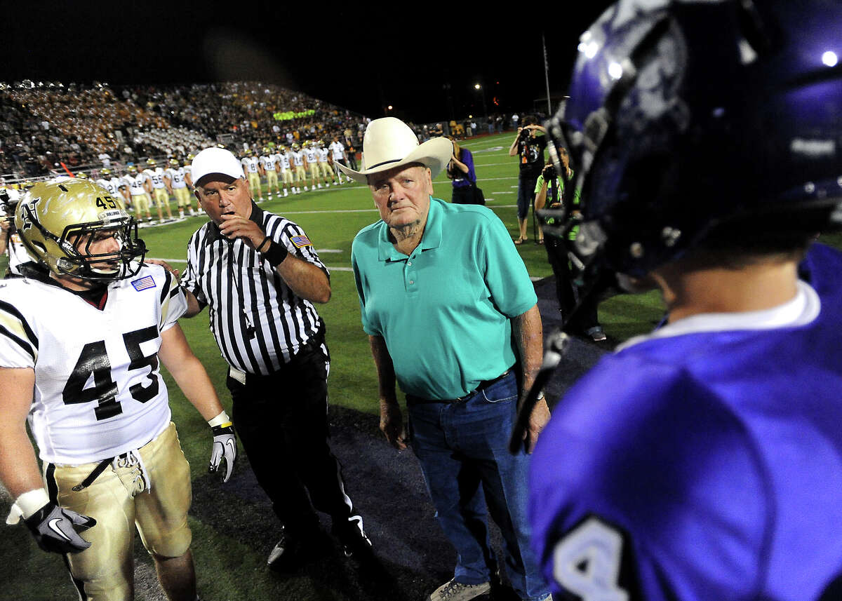 Former Houston Oilers coach, Bum Phillips is honored before the Mid-County Madness game at Port Neches-Groves High School in Port Neches Friday, September 30, 2011. Tammy McKinley/The Enterprise
