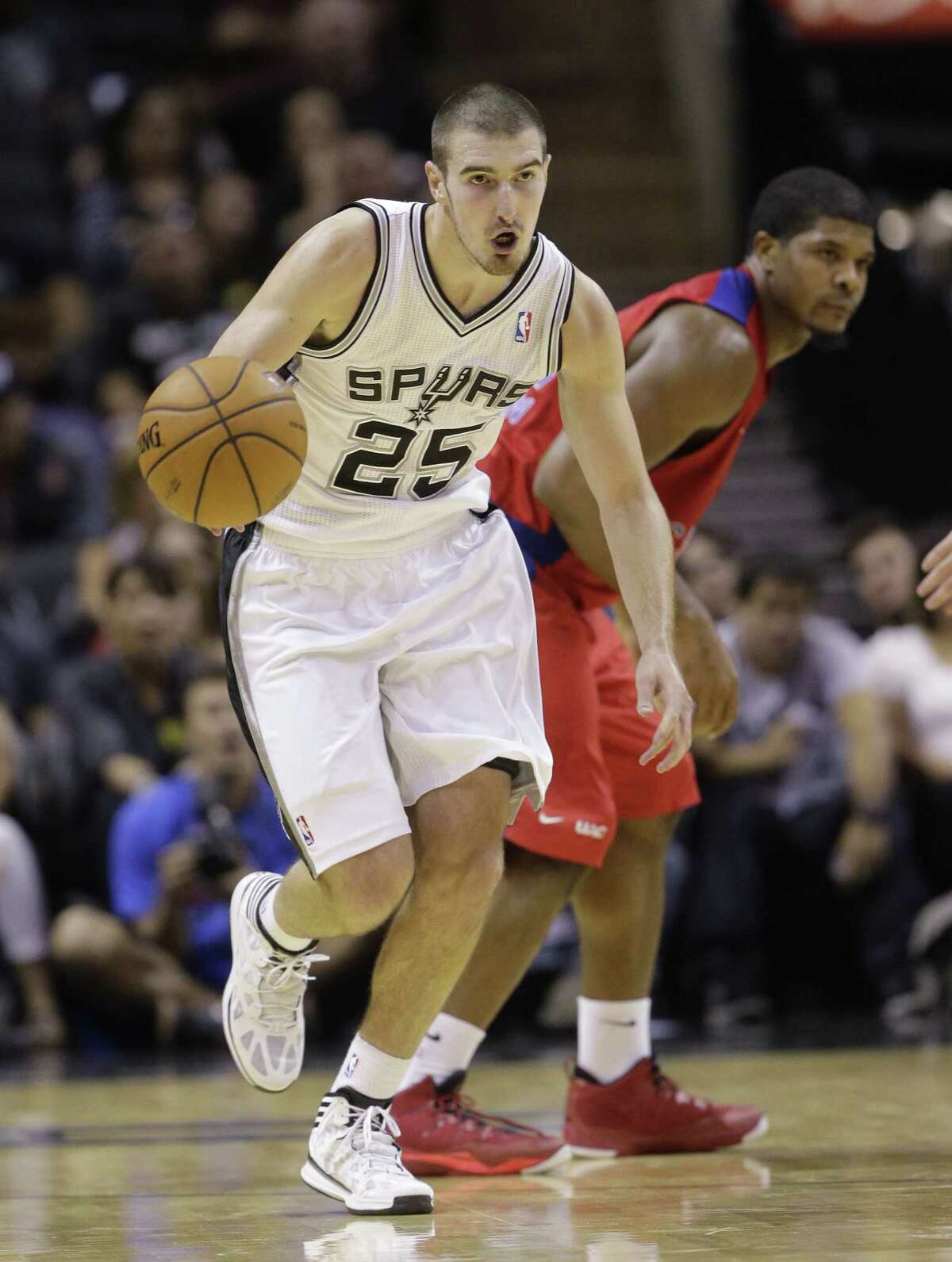 Point guard Nando De Colo is averaging 15.4 minutes in the preseason games as the Spurs try to build his confidence.