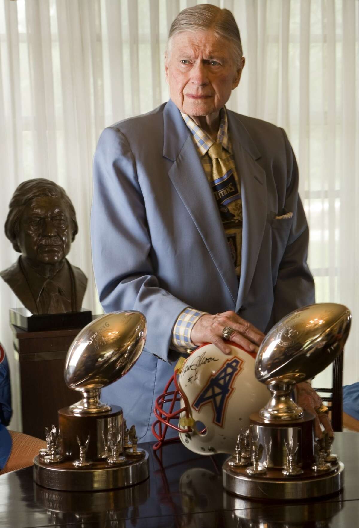 Bud Adams poses for a photo at his Houston home in 2009. Adams died on Oct. 21, 2013. He was 90 years old.
