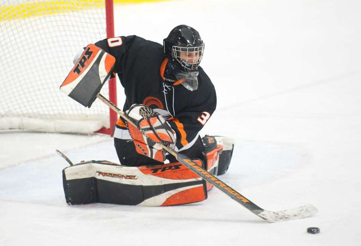 Stamford's Jon Tenca makes save during an FCIAC hockey game at Terry Conners Rink in Stamford, Conn. on Wednesday, Jan. 27, 2010. Stamford High School defeated Trinity Catholic High School 4-3 in overtime.