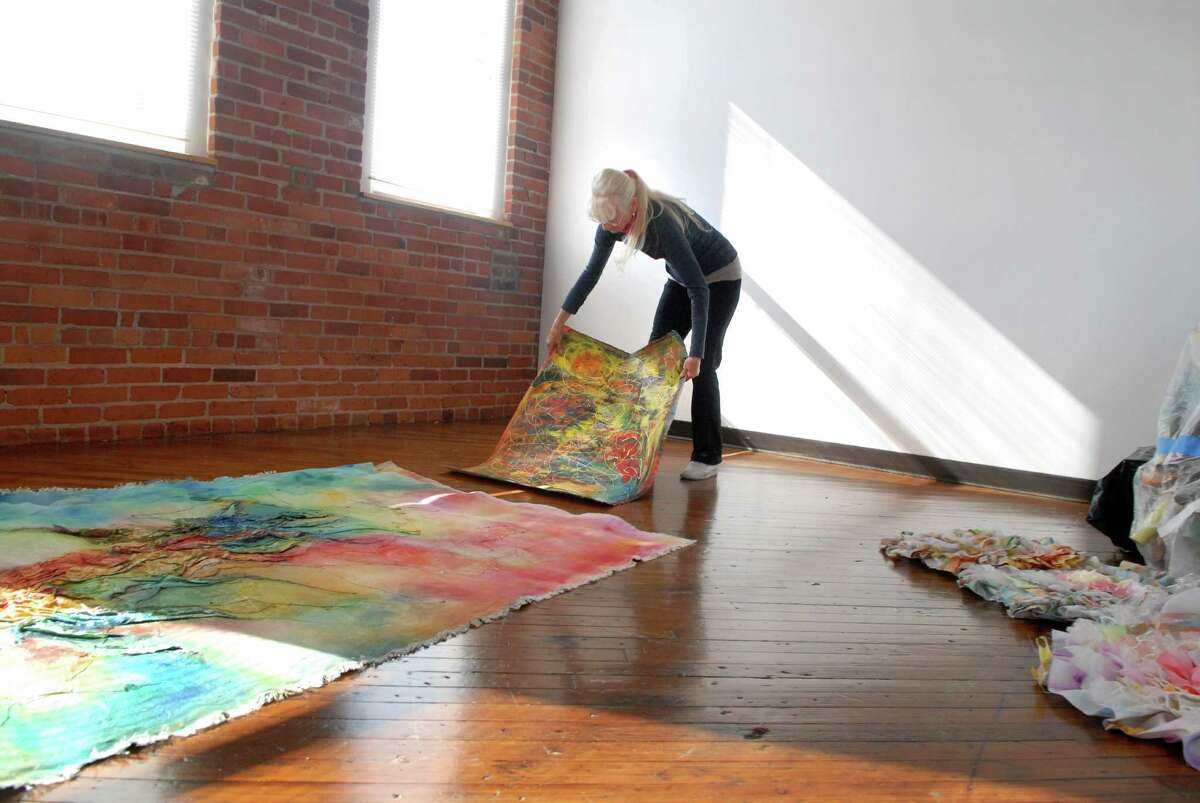 Artist Claire Koch sets up her studio in the Loft Artist Association's new building at 575 Pacific Street in Stamford, Conn. on Monday October 21, 2013.