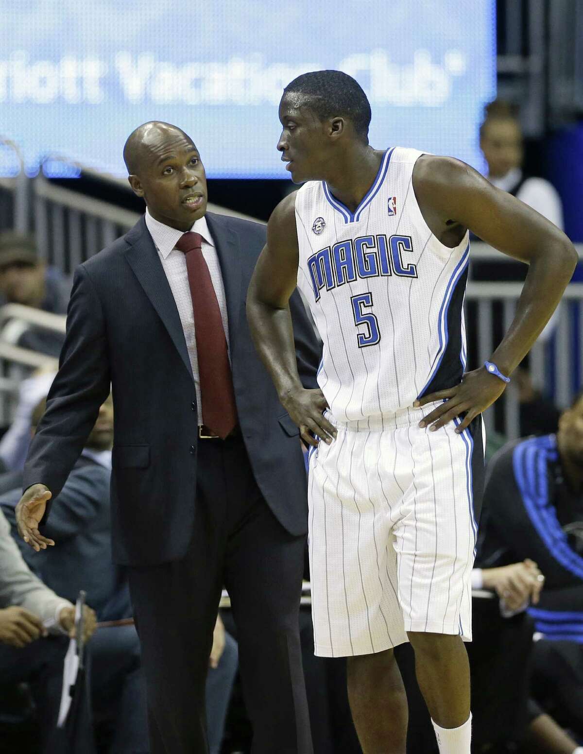 Magic rookie Victor Oladipo (right) can expect afternoon shootarounds with coach Jacque Vaughn.