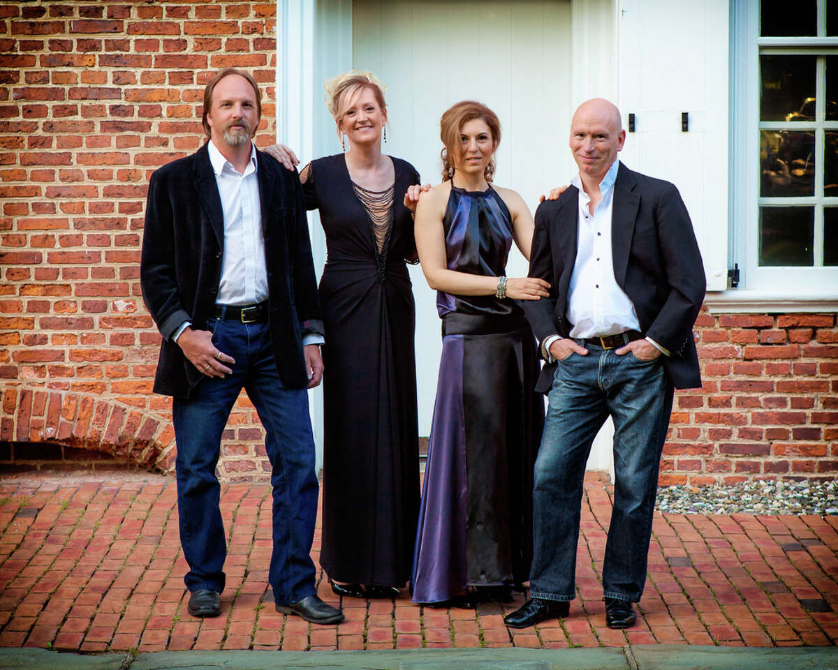 The Musicians of Ma'alwyck are Sten Yngvar Isachsen (guitar), left, Ann-Marie Barker Schwartz (director, violin), Petia Kassarova (violencello) and Norman Thibodeau (flute), as seen in this 2013 publicity photo. (Courtesy the artists)