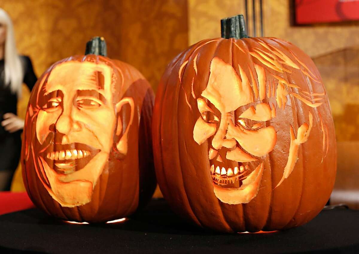 Pumpkins carved in the likeness of President Barack Obama and First Lady Michelle Obama are displayed as Madame Tussauds New York kicks off a special Halloween weekend featuring a live pumpkin carving performance at Madame Tussauds New York on October 22, 2013 in New York City.