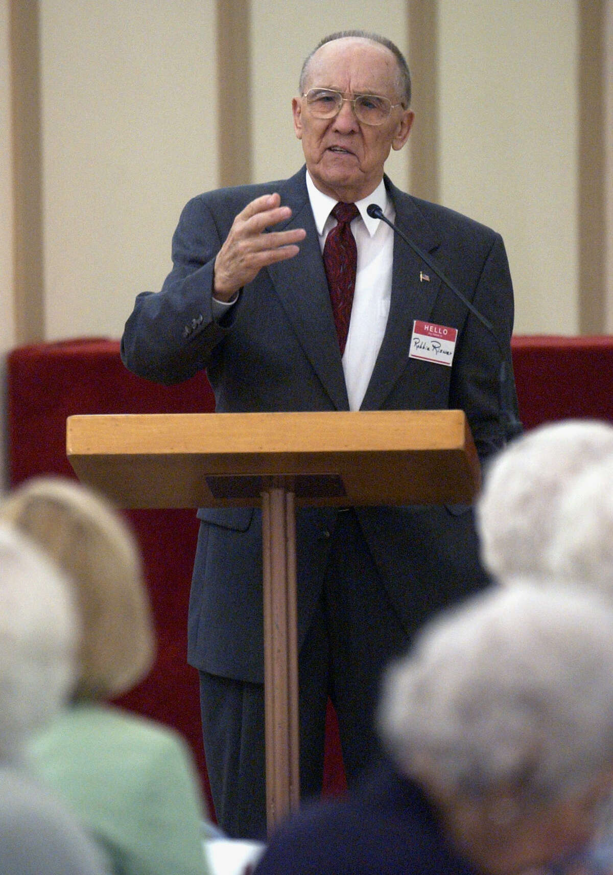Retired Air Force Brig. Gen. Robbie Risner speaks Thursday afternoon March 13, 2003 at St. Mark's Episcopal Church during a Republican Business Women of Bexar County luncheon. Risner was held as a prisoner of war at the so-called "Hanoi Hilton" for seven years during the vietnam war. (WILLIAM LUTHER/STAFF)