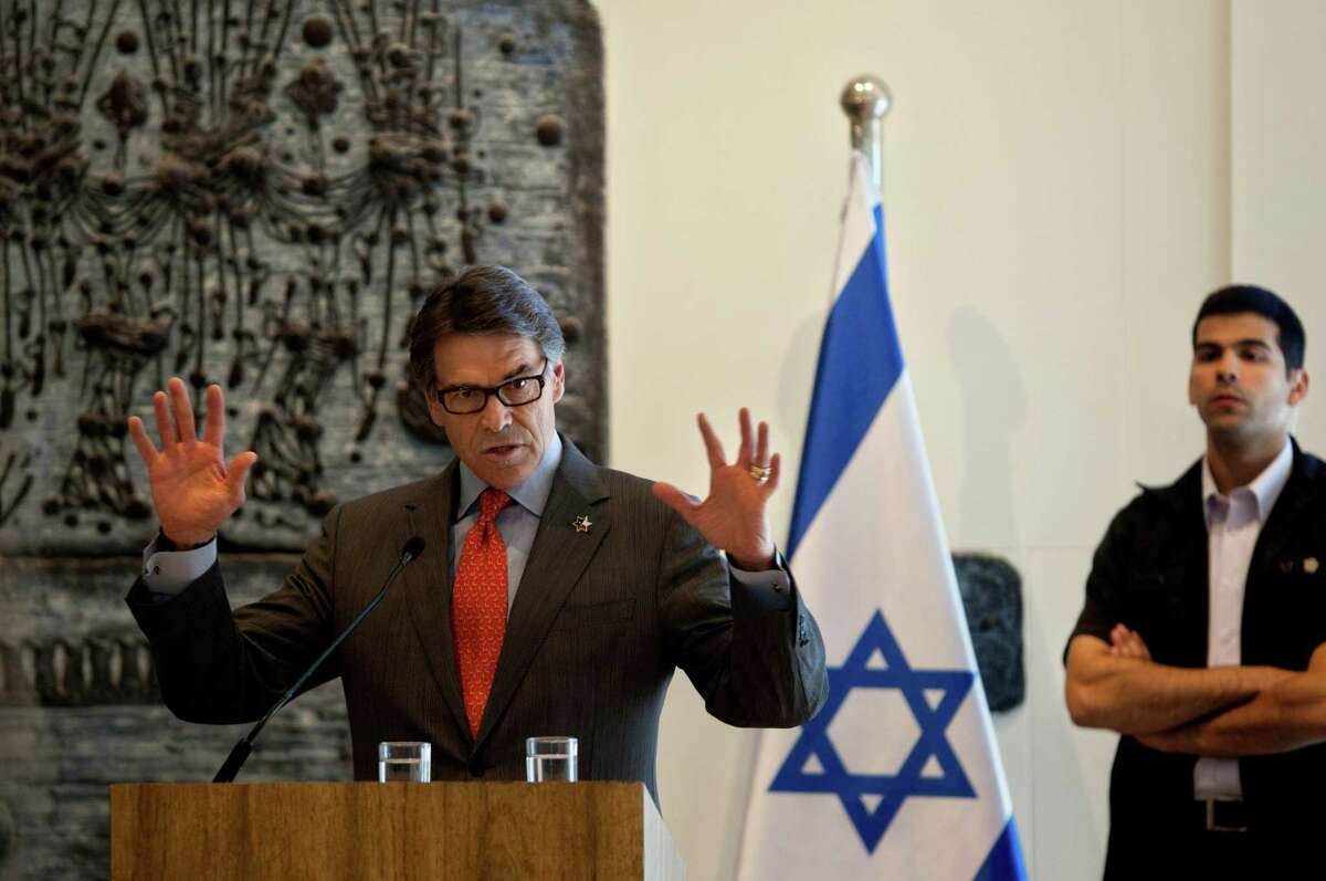 Texas Gov. Rick Perry, gestures as he speaks during a ceremony at Israel's President Shimon Peres residence in Jerusalem, Wednesday, Oct. 23, 2013. Texas A&M University said it plans on opening a branch campus in Israel, a first-of-its-kind project that will expand the American university’s growing overseas presence. (AP Photo/Sebastian Scheiner)