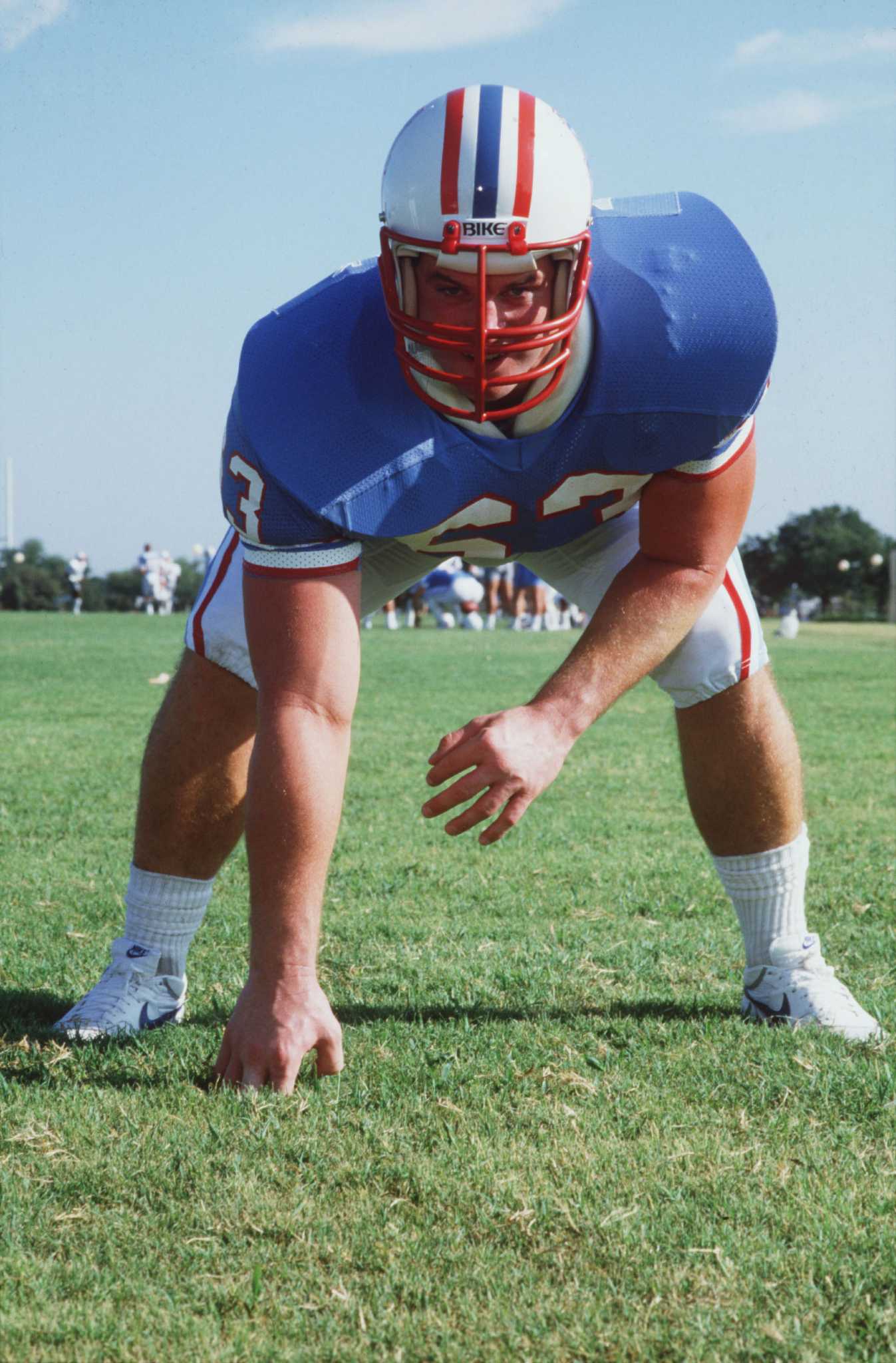 Houston Oilers wide receiver Ernest Givins looks over his shoulder