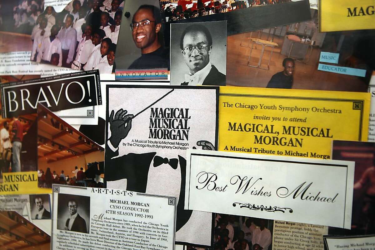 Members of the Chicago Youth Symphony gave Michael Morgan a collage when he left in 1993 which he has framed in his home in Oakland, California, on Wednesday, October 16, 2013.