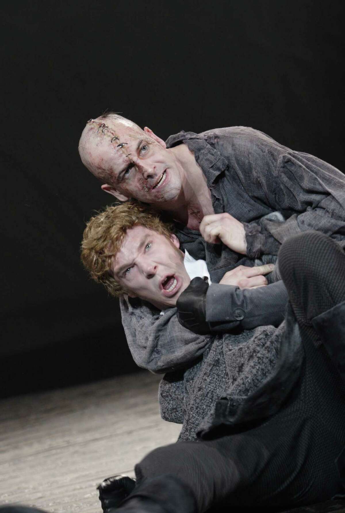 London's National Theatre production of "Frankenstein" will be broadcast twice on Friday, Nov. 1, at Fairfield University. Above is Jonny Lee Miller as the Creature, and Benedict Cumberbatch as Victor Frankenstein.