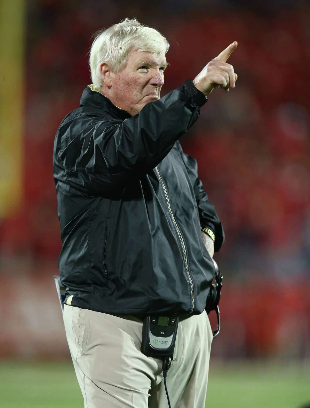 LOUISVILLE, KY - OCTOBER 18: George O'Leary the head coach of the Central Florida Knights gives instructions to his team during the game against the Louisville Cardinals at Papa John's Cardinal Stadium on October 18, 2013 in Louisville, Kentucky.