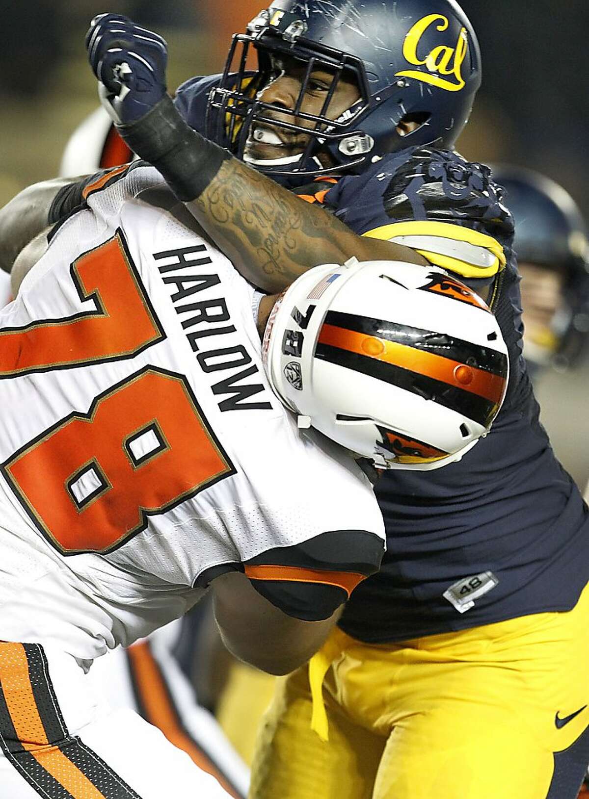 California defensive lineman Deandre Coleman (91) rushes the quarterback against Oregon State offensive linesman Sean Harlow (78) during the second half of an NCAA college football game in Berkeley, Calif., Saturday, Oct. 19, 2013. (AP Photo/Tony Avelar)