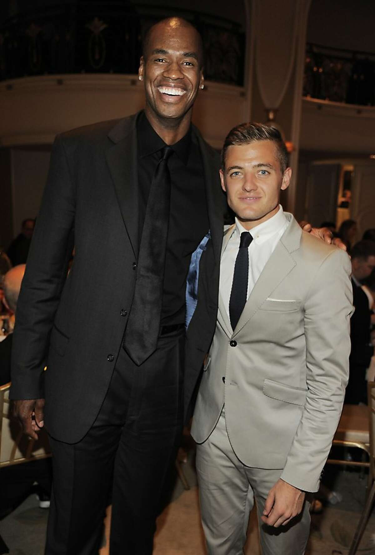 NBA basketball player Jason Collins, left, and Los Angeles Galaxy soccer player Robbie Rogers pose together at the 9th Annual Gay, Lesbian & Straight Education Network Respect Awards at The Beverly Hills Hotel on Friday, Oct. 18, 2013 in Beverly Hills, Calif. (Photo by Chris Pizzello/Invision/AP)