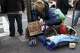 The city's panhandlers tell their own stories