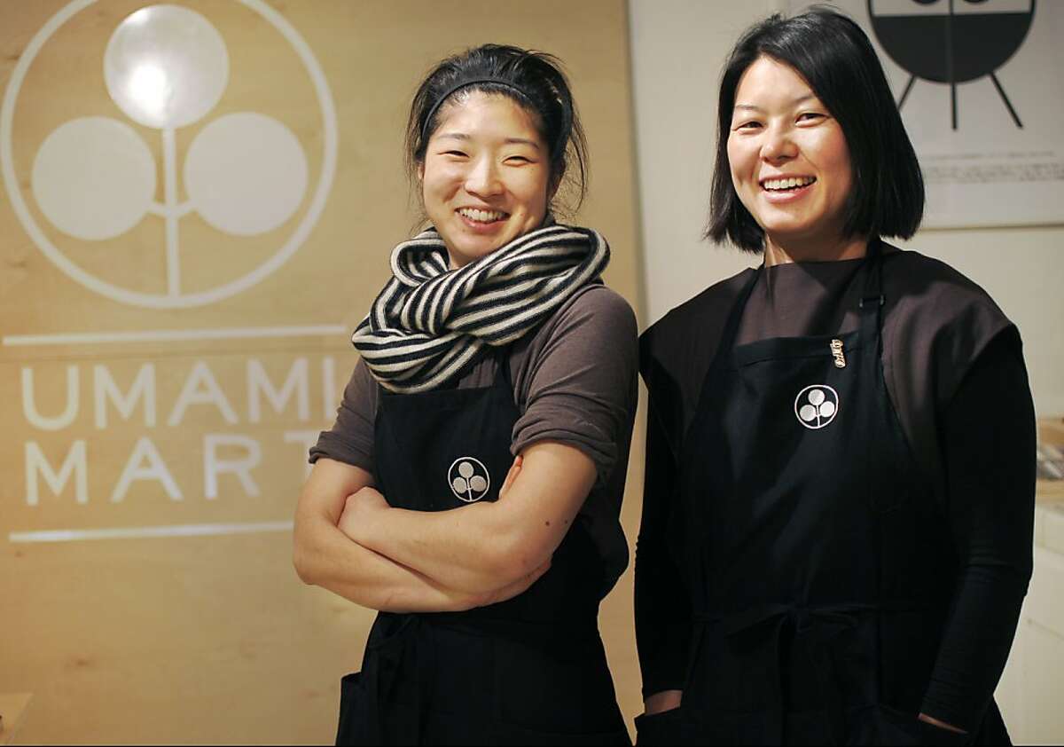 Co-founders Yoko Kumano, 32, left, and Kayoko Akabori, 33, pictured October 24, 2013 at their new pop up, Umami Mart, located inside Perish Trust on Divisarero in San Francisco, Calif. Kumano and Akabori, who have known each other since high school, opened Umami Mart in Oakland one year ago. The entire venture, which features imported Japanese popular barware, glassware, tableware and prints, started with a food blog.