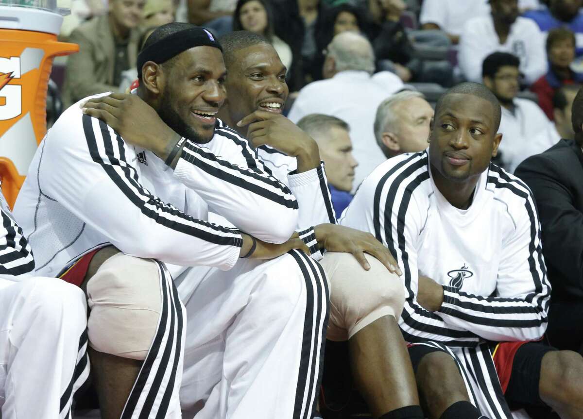 Miami's Big Three — LeBron James (from left) Chris Bosh and Dwyane Wade — have their sights set on winning their third consecutive title this season.