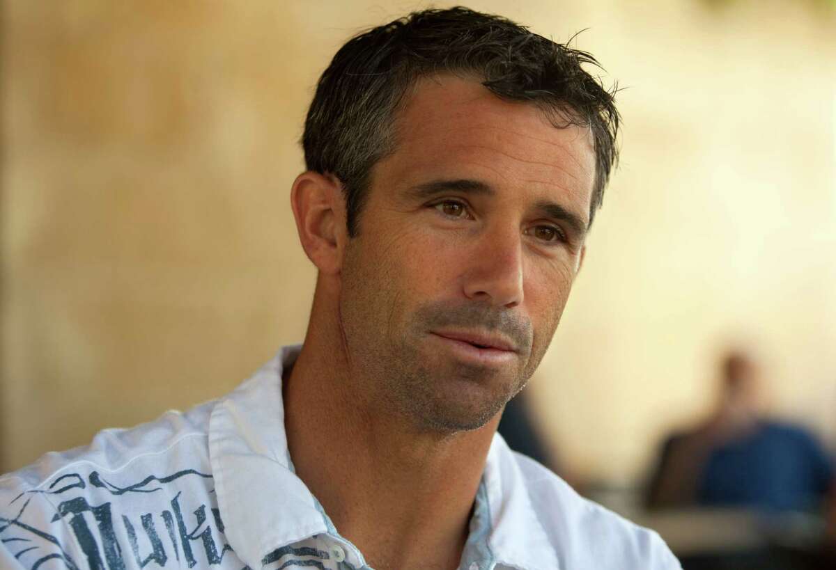 Former professional baseball player Brad Ausmus speaks during an interview with the Associated Press, Monday, May 21, 2012, in Jerusalem. With a pair of Jewish ex-major leaguers on his roster, Ausmus, the new coach of Israel's team in next year's World Baseball Classic, says his squad is already a legitimate contender. (AP Photo/Sebastian Scheiner)