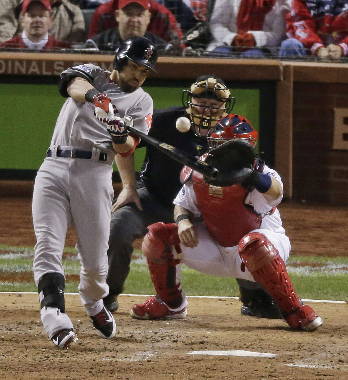 Jacoby Ellsbury of the Red Sox delivers an RBI single in the seventh inning to produce Boston's third run of Game 5 against the Cardinals.