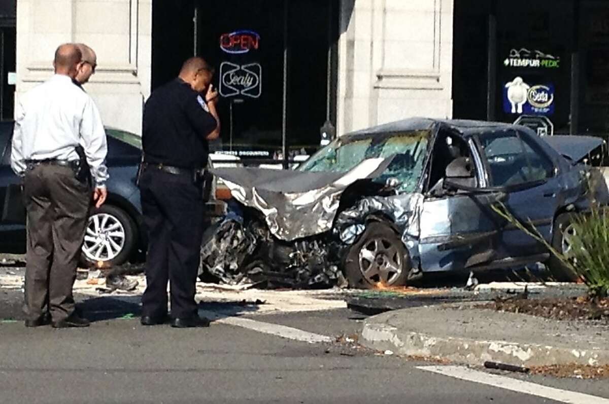 This stolen Honda Accord triggered a 4-car accident when the driver ran a red light at 10th Avenue and Geary Boulevard. Five people were injured, two seriously, in the kaleidoscope of somersaulting vehicles and flying debris that followed.