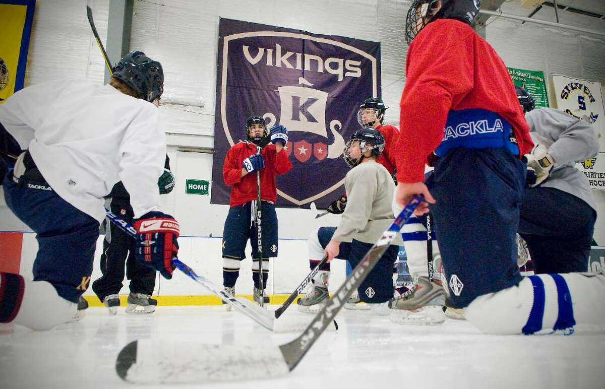 Members of the King hockey team gather for practice at Twin Rinks in Stamford, Conn. on Thursday, Jan. 28, 2010.