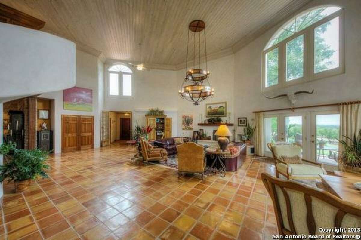 Hill Country retreat featuring stables and plane hangar