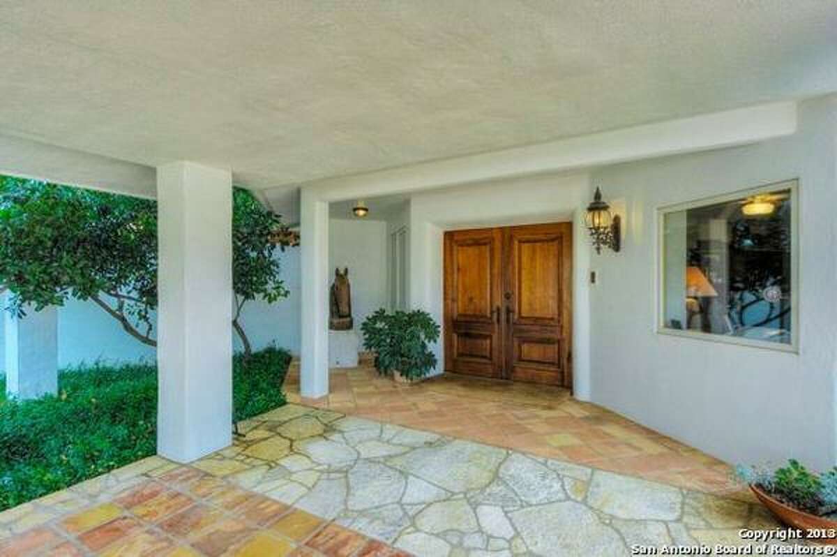 Hill Country retreat featuring stables and plane hangar