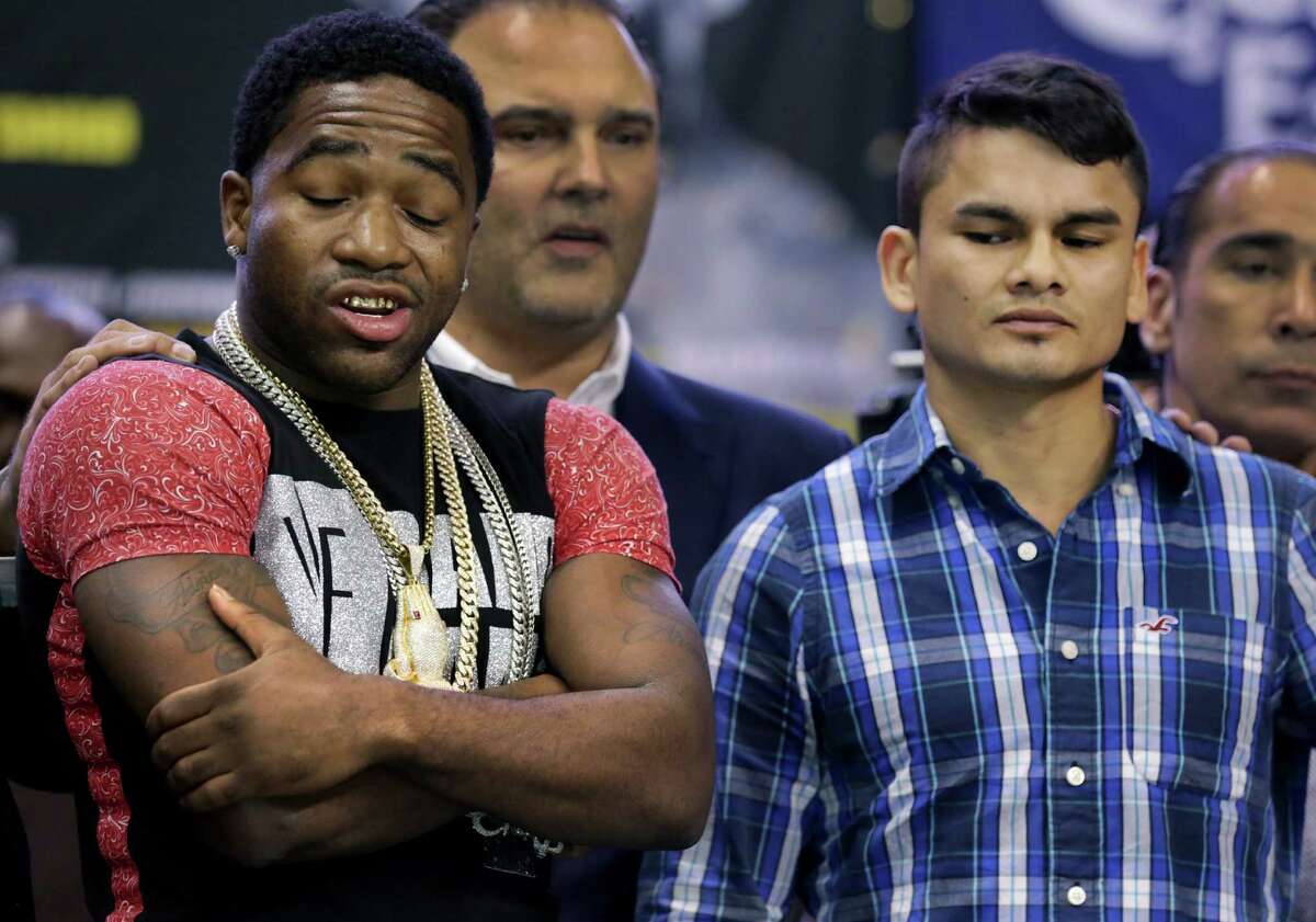 Adrien "The Problem" Broner, left, and his opponent Marcos "El Chino" Maidana, right,avid eye contact during a press conference for the Dec. 14 fight involving Broner, the WBA Welterweight Champion and Maidana, former WBA Junor Welterweight Champion at the Alamodome. Thursday, Oct. 31, 2013