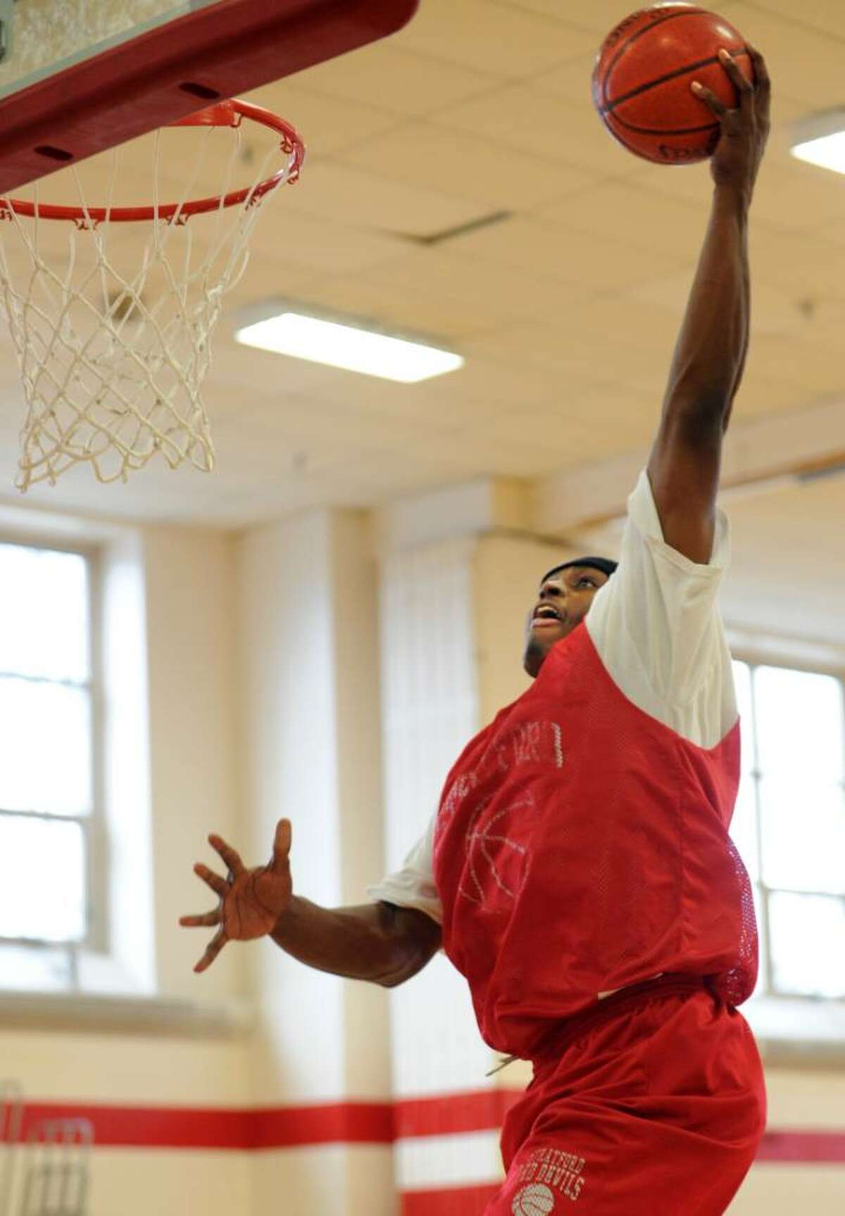 Stratford's Brandon Sherrod soars to the net for a dunk Wednesday Jan. 27, 2010 during practice at Stratford High.