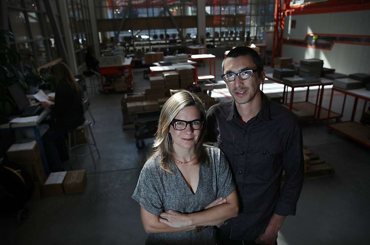 Catherine Bailey (l to r) and Robin Petravic, who are the owners of Heath Ceramics, are seen in their factory with quality control behind them and and kiln at background right on Wednesday, October 16, 2013 in San Francisco, Calif.