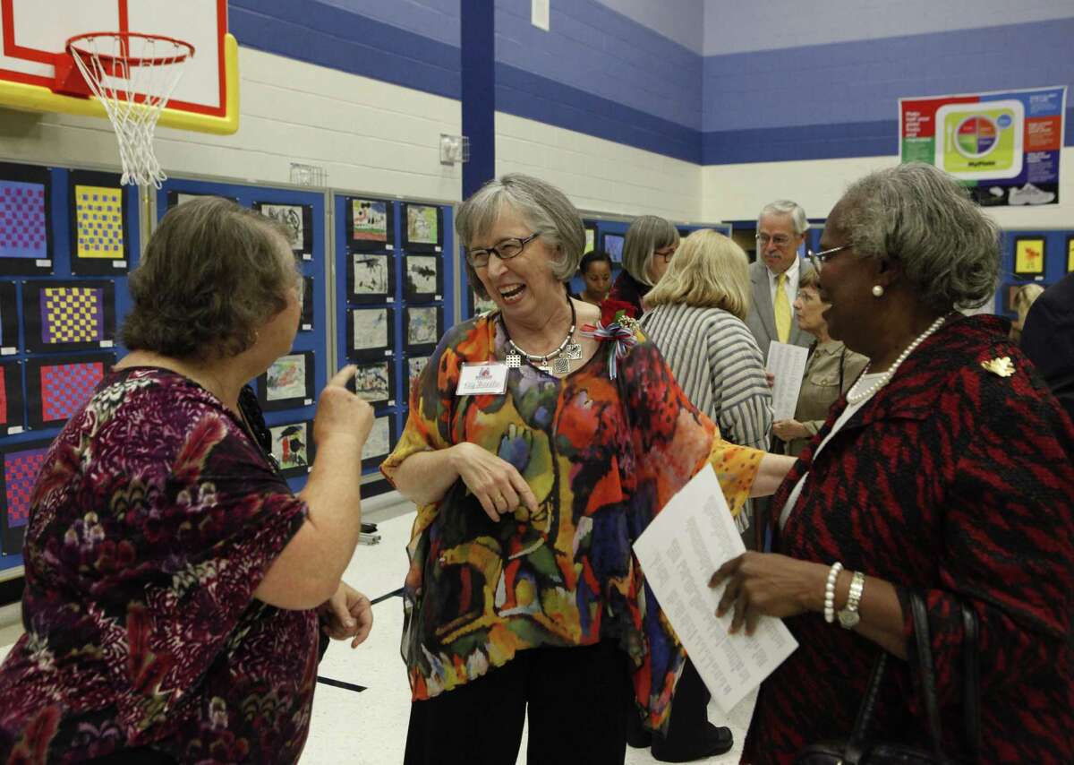 Kay Franklin (center) greets people after the dedication of Kay Franklin Elementary School on Wednesday. Franklin retired in 2008 as Northside's deputy superintendent for administration.