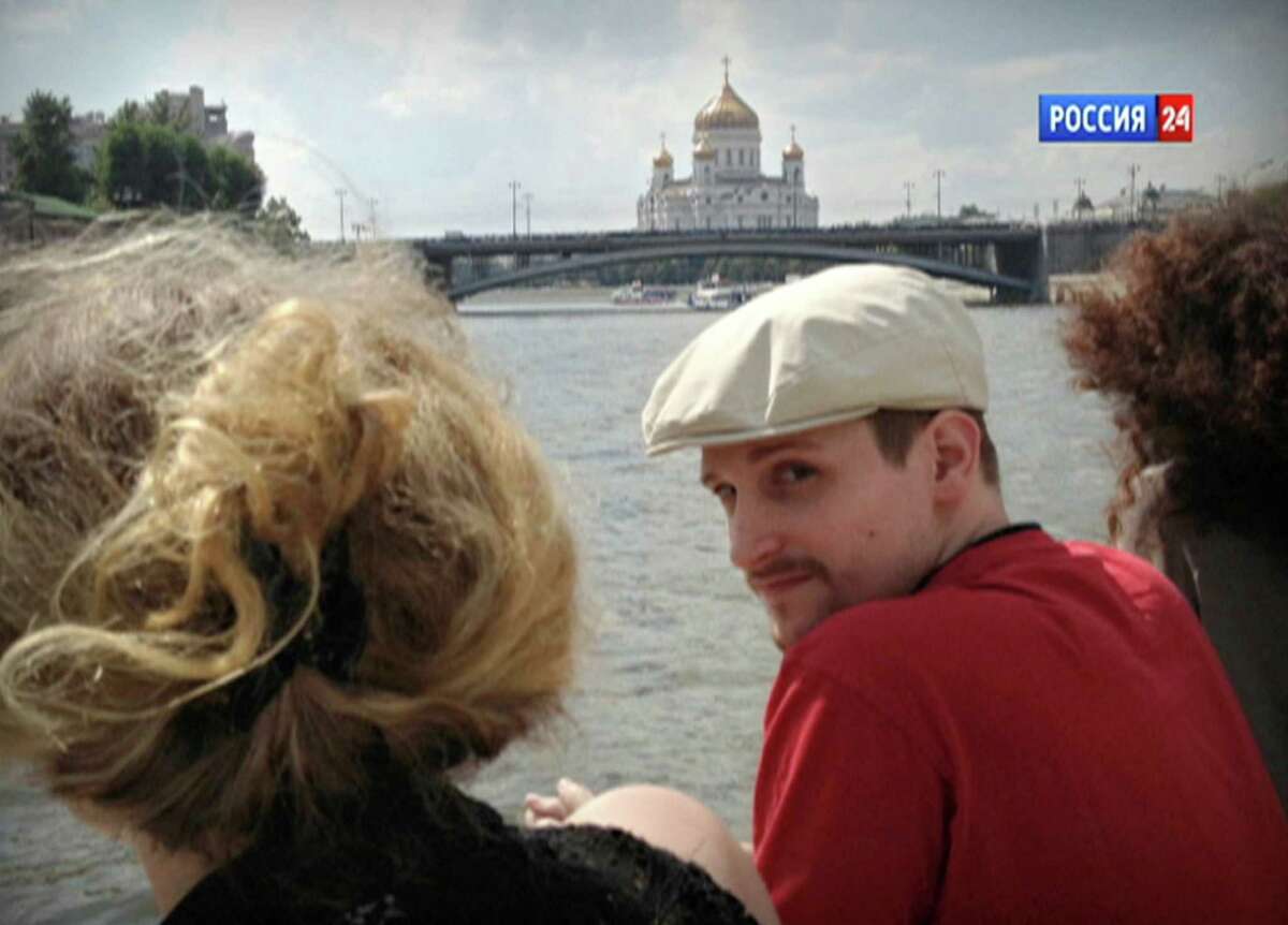Former NSA systems analyst Edward Snowden rides a boat on the Moscow River in Russia.