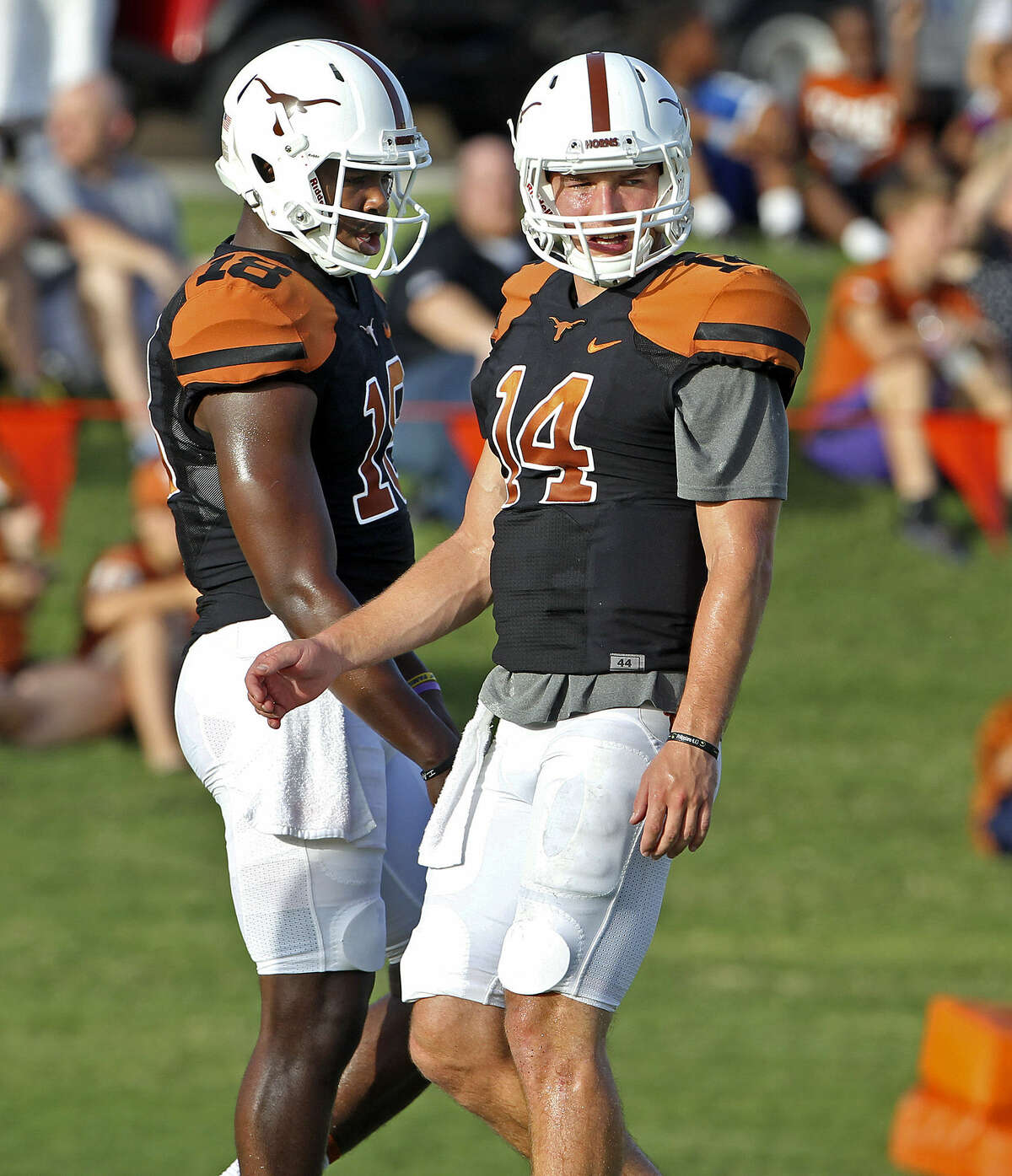 David Ash (right) has been injured most of the season, forcing freshman Tyrone Swoopes into action.