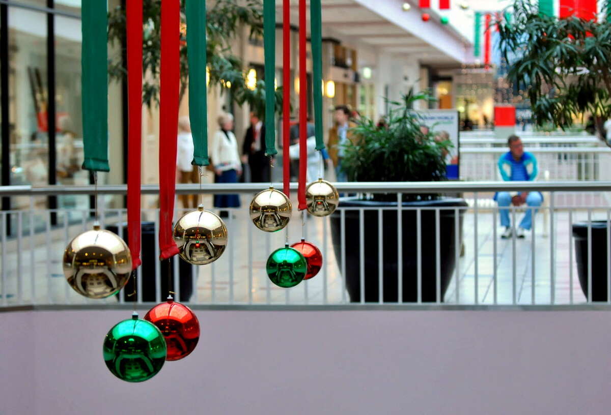 Shoppers move about Crossgates Mall in Guilderland, NY on Wednesday November 17, 2010. ( Philip Kamrass / Times Union )
