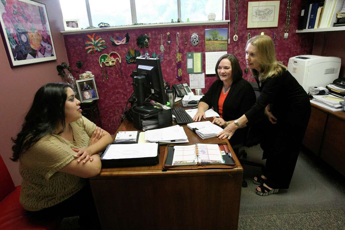 Xochitl Medin speaks with Lynn Rangel and Pamela Bain at Bain Medina Bain, a surveying and civil engineering firm. The company, with 48 full-time employees and four interns, would have faced a 50 percent increase in their premiums this year if they had stayed with the Aetna policy, so they will be switching to a United Health Care policy on Friday (Nov. 1). President and co-owner Pamela Bain said the company has dodged a bullet for now, but she's apprehensive about what next year will bring. The firm has a number of employees who have been there for decades, so they have an older workforce.