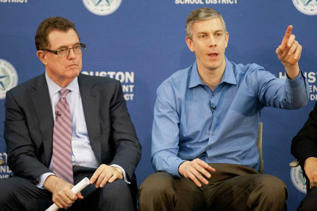 Secretary of Education Arne Duncan, right, makes remarks while seated next to HISD Superintendent Dr. Terry Grier during a panel discussion at Lee High School Friday, Feb. 15, 2013, in Houston. ( Brett Coomer / Houston Chronicle )