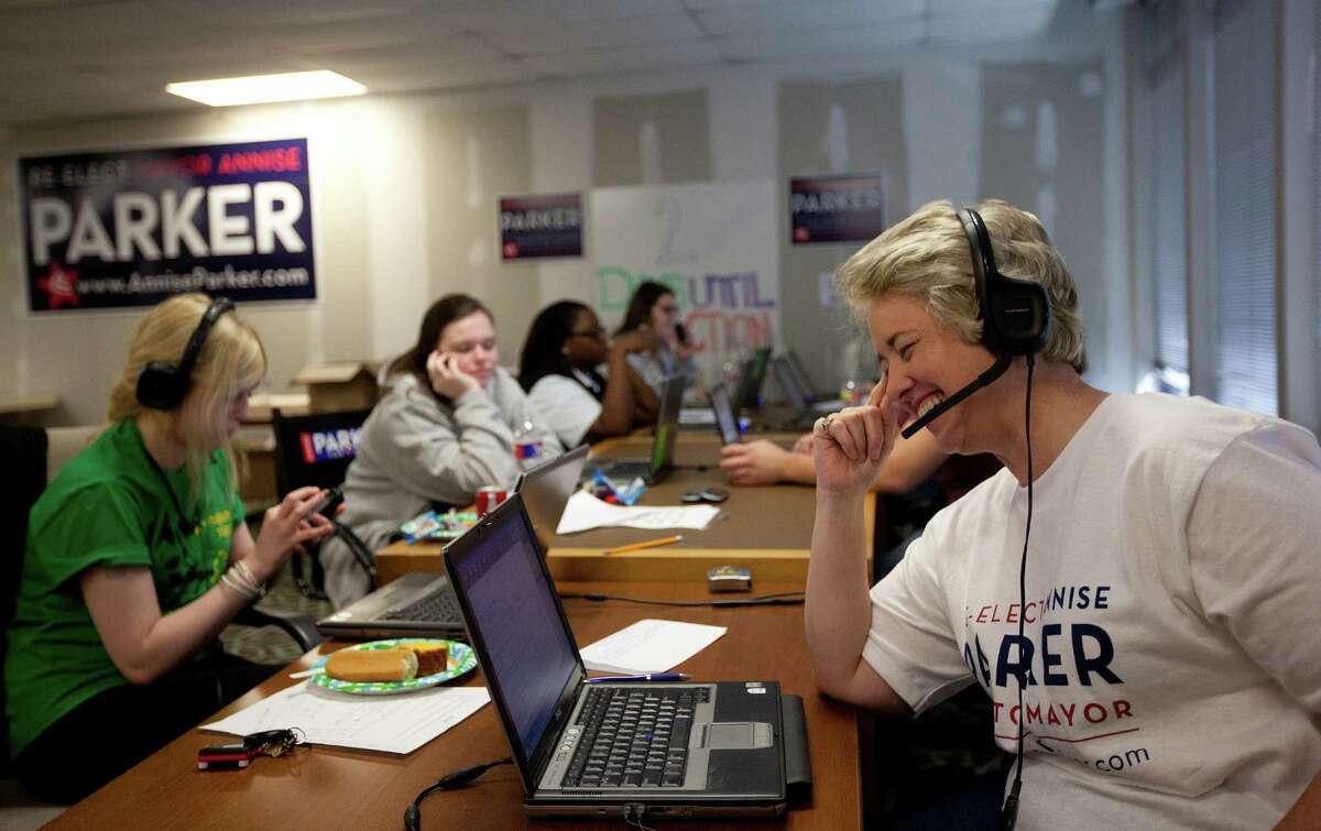 Houston Mayor Annise Parker makes calls from her campaign headquarters to Houstonians asking for their support two days before the election.