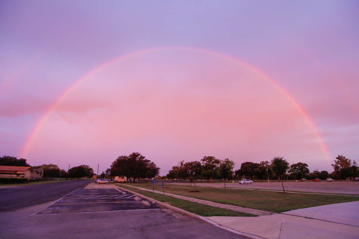 An early morning rainbow as seen from the Harlandale Memorial Stadium parking lot looking west across Roosevelt Avenue on Monday, Nov. 4, 2013.