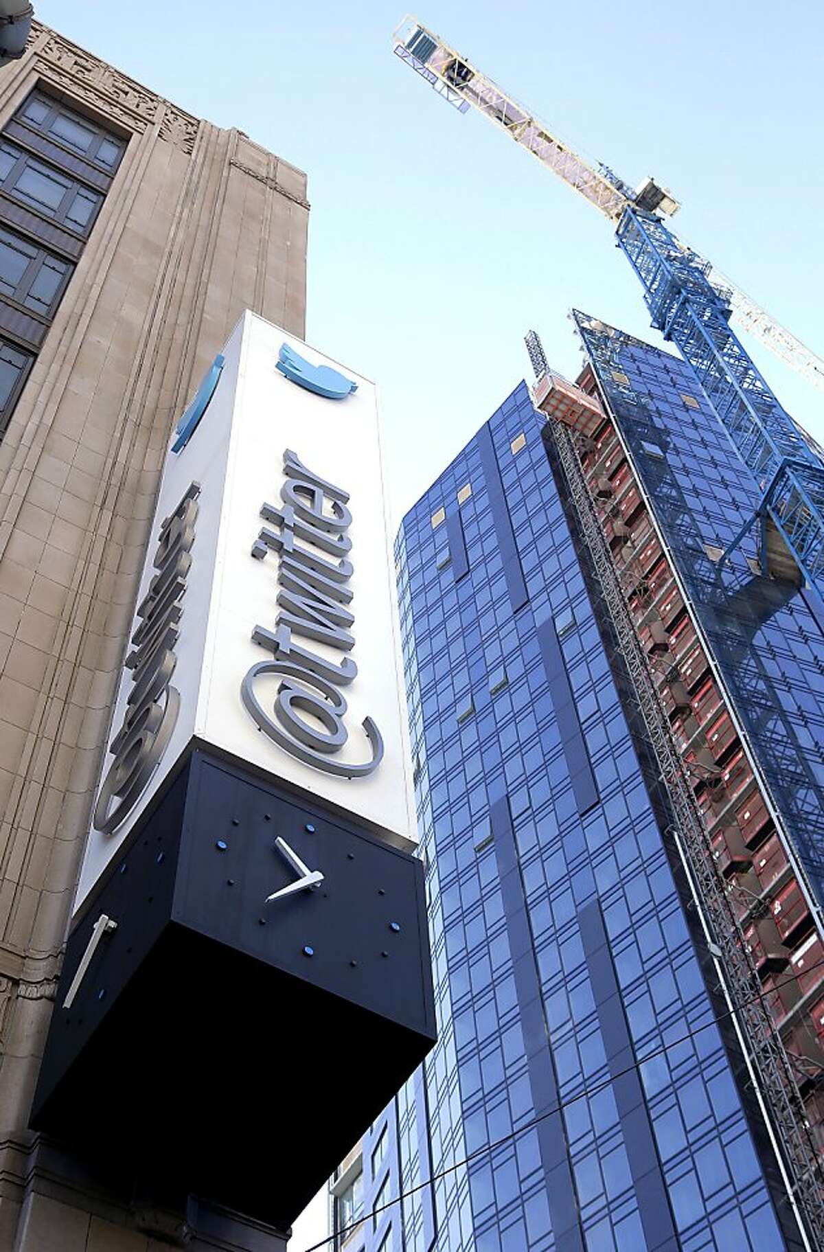 This photo shows the sign outside of Twitter headquarters in San Francisco, Monday, Nov. 4, 2013. As Twitter prepares to complete its initial public offering of stock this week, the San Francisco company's history of losses totaling nearly $500 million is raising questions about its ability to turn a cultural phenomenon into a sustainable business. (AP Photo/Jeff Chiu)