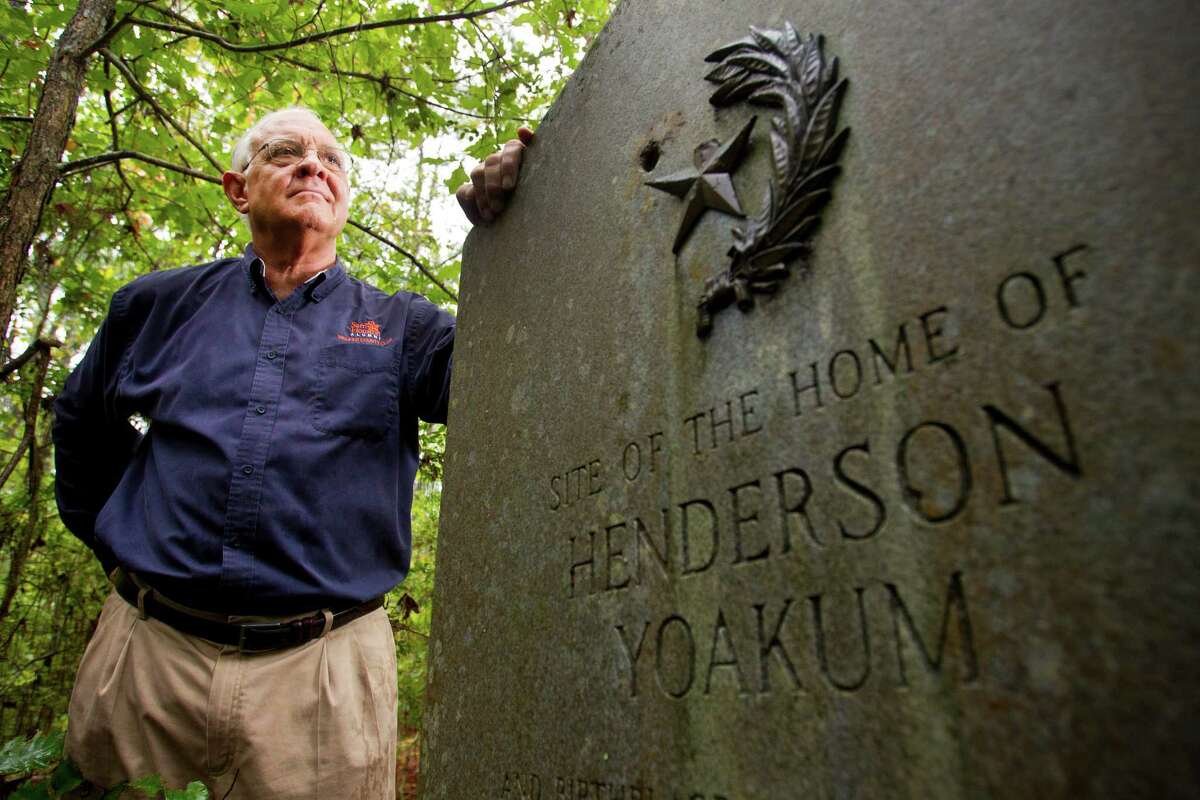 Mac Woodward, great-great-great grandson of Henderson Yoakum, stands near a dilapidated historical marker honoring Yoakum Thursday, Oct. 31, 2013, in Huntsville. Several of the state's historical markers fallen into disrepair. The state is making efforts to repair or replace hundreds of the markers erected to state heroes and sites. ( Brett Coomer / Houston Chronicle )