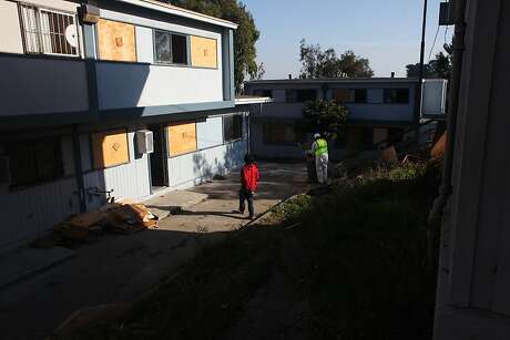 A high school student who gave his name as "Jay" wanders through the old portion of the Hunters View community during pre-demolition cleanup on October 30, 2013 in San Francisco, Calif. The portion of the housing project south of West Point Road and west of Middle Point Road is currently being dismantled.