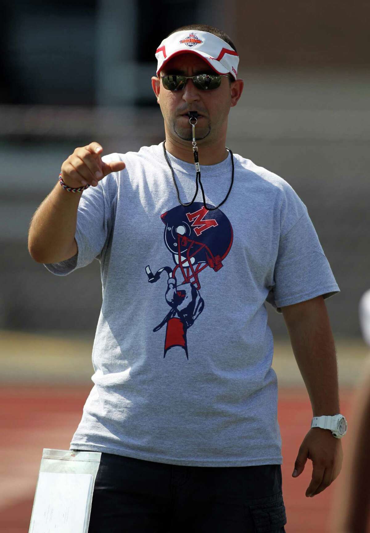 A.J. Albano, the head football coach at Brien McMahon High School, during a team practice earlier this season. His team was undefeated as of last week.
